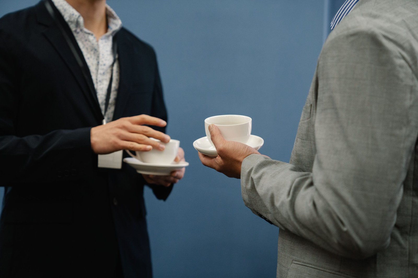 Business networking conversations — illustrative photograph